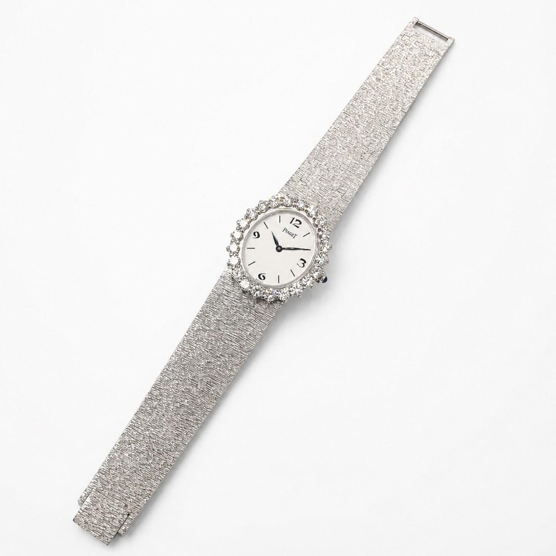 Piaget ladies manual wind watch in 18K white gold with diamonds: Piaget ladies manual wind watch in 18K white gold with diamonds Piaget 18K white gold ladies watch with a manual winding movement. The watch is set with 22 diamonds weighing approximately 2.60 ct tota