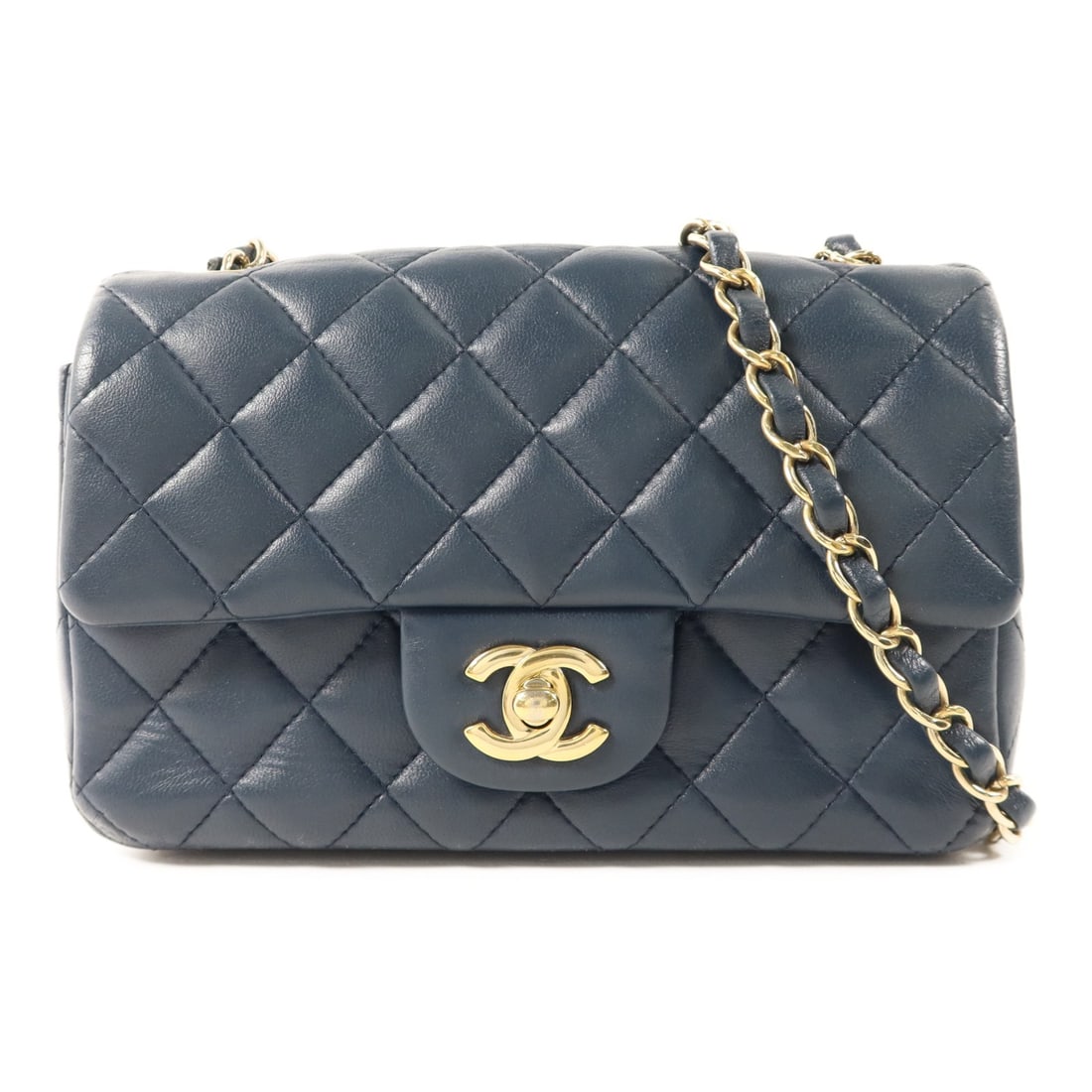 CHANEL A69900 Mini Classic 20 Navy Lambskin Chain Shoulder Bag: CHANEL A69900 Mini Classic 20 Navy Lambskin Chain Shoulder Bag A CHANEL Mini Classic 20 chain shoulder bag in navy lambskin leather with GHW and turn-lock closure. The bag is described as AB condition