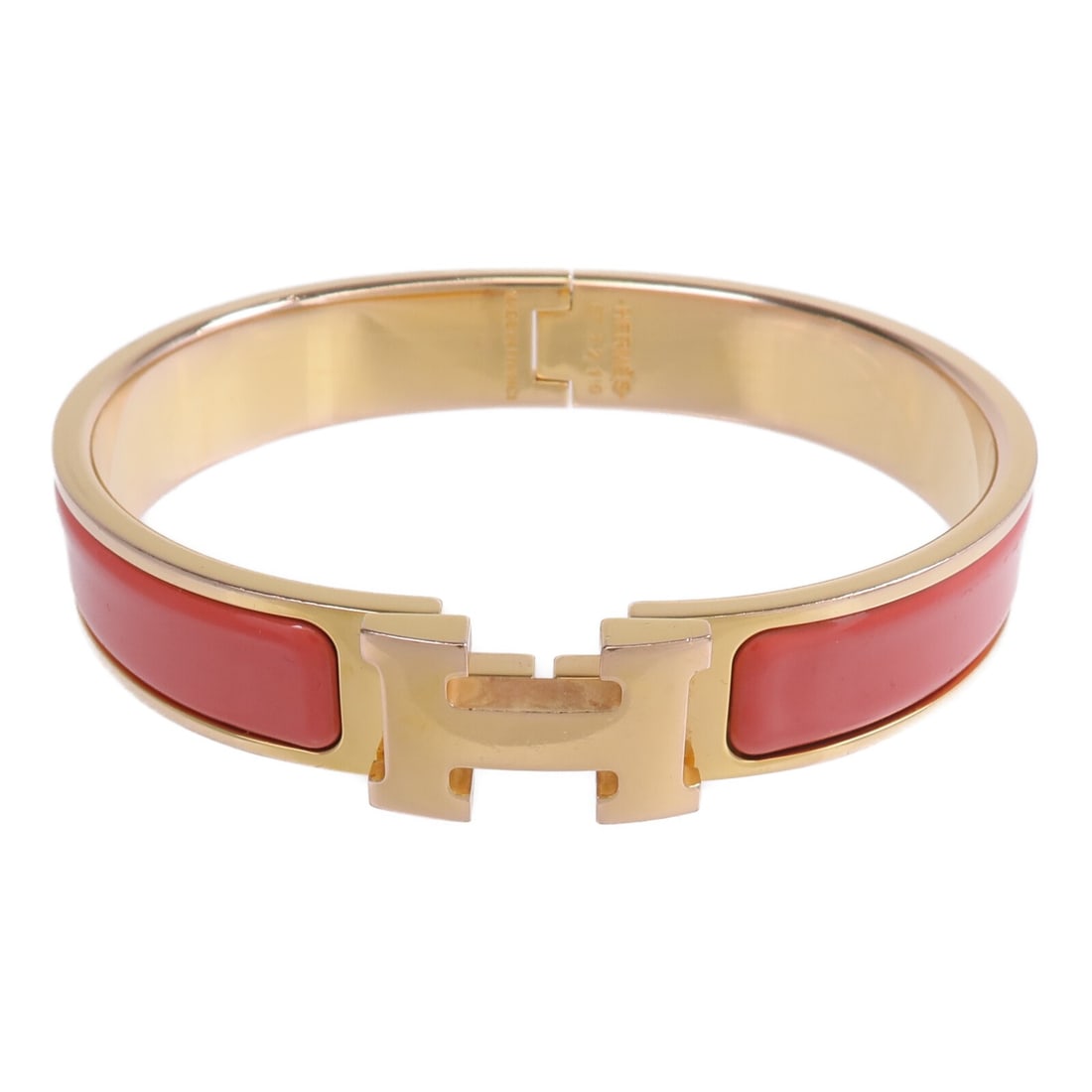 Hermes Clic H pink enamel bracelet with gold tone metal: Hermes Clic H pink enamel bracelet with gold tone metal Hermes Clic H bracelet in enamel and metal with a pink and gold color combination. It is a women's regular-size bracelet made in France and come