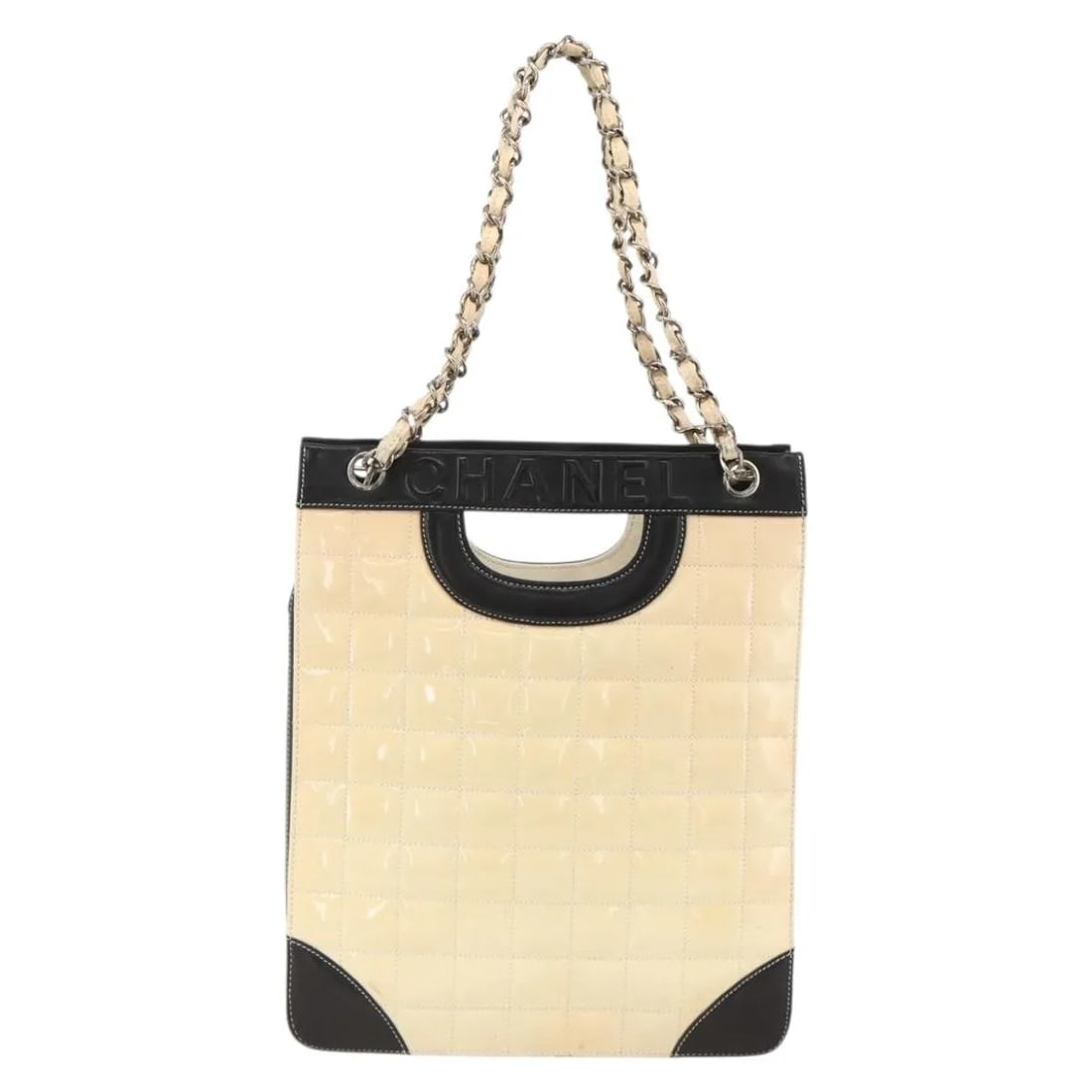 Chanel Beige Patent Leather Chocolate Bar Tote: Chanel Beige Patent Leather Chocolate Bar Tote This Chanel Chocolate Bar Shopping Tote features a quilted design crafted from beige patent leather. Made in Italy, it is designed for women and offers a
