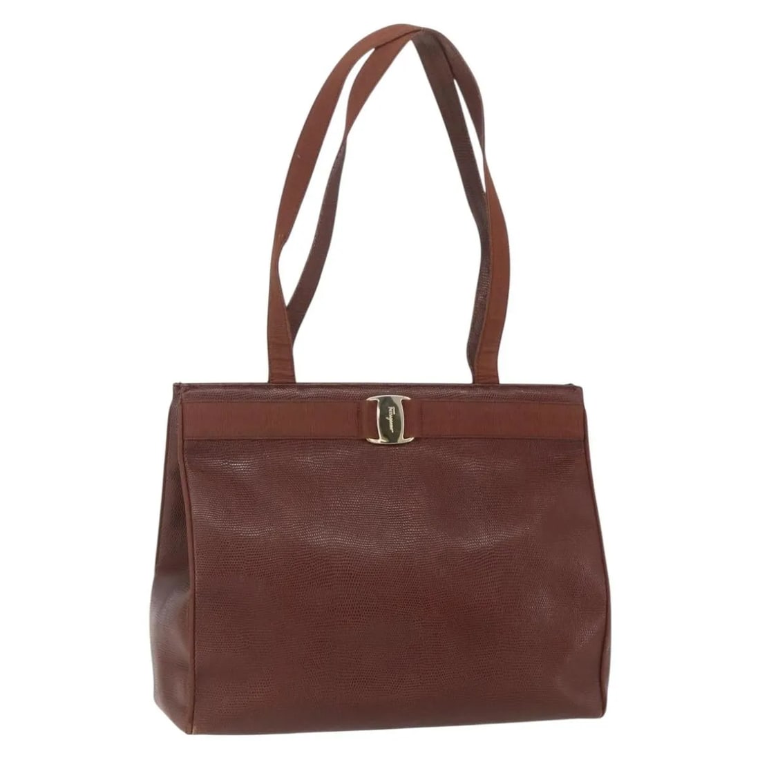 Brown Leather Shoulder Bag Salvatore Ferragamo Vala Italy: Brown Leather Shoulder Bag Salvatore Ferragamo Vala Italy This Salvatore Ferragamo Vala shoulder bag is crafted from brown leather and designed for women. Made in Italy, it features a structured silho