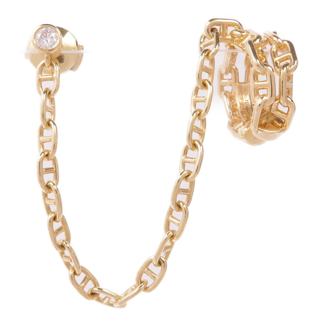 HERMES Chaine d'ancre Calypso single right ear climber earring 18KYG: HERMES Chaine d'ancre Calypso single right ear climber earring 18KYG A HERMES pierced earring in the Chaine d'ancre Calypso design, presented as a right single ear climber. It is made of K18 yellow go