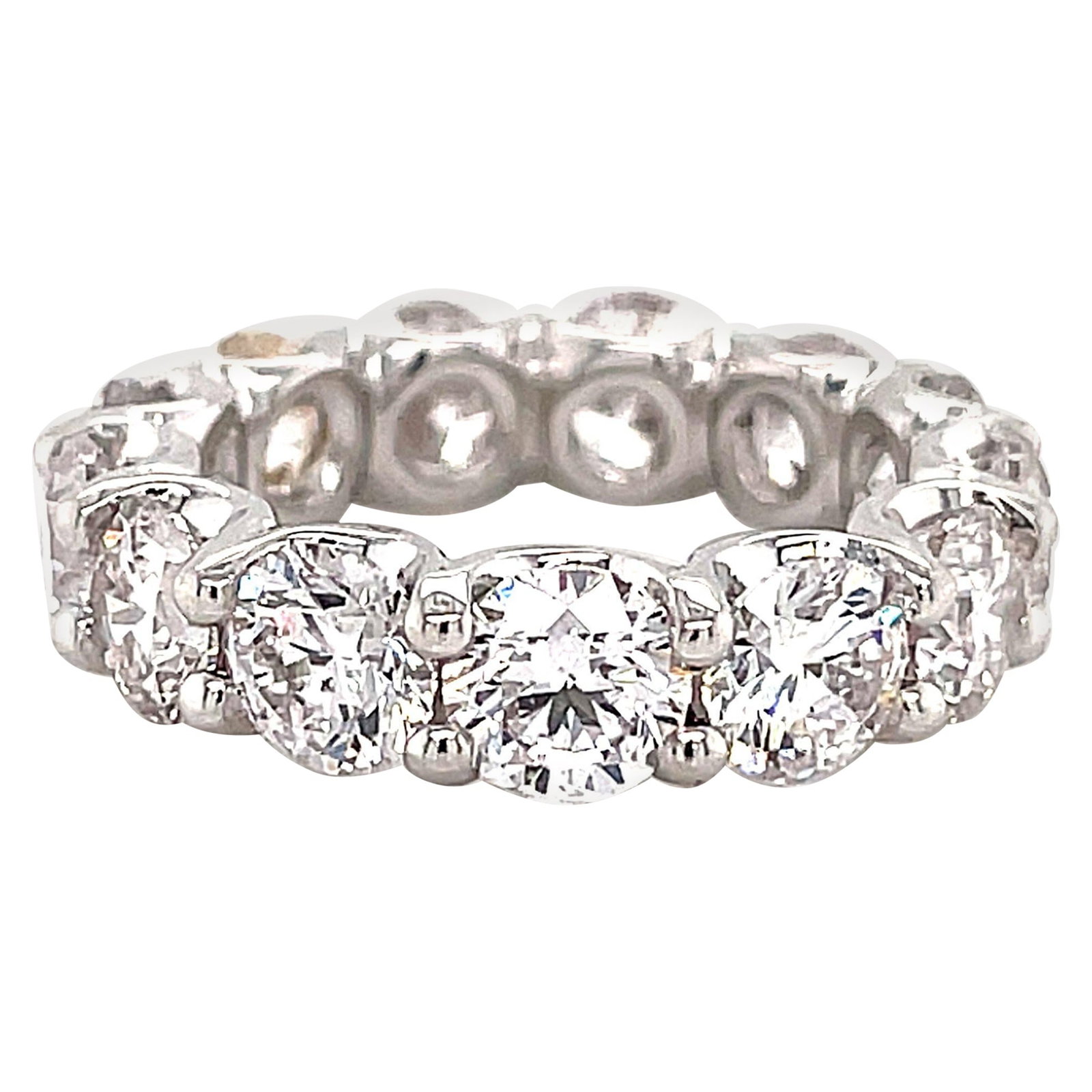 5.28ct Round Diamond Eternity Band 18k White Gold: 5.28ct Round Diamond Eternity Band 18k White Gold This stunning diamond eternity band features 13 round brilliant diamonds totaling 5.28 carats, set in luxurious 18k white gold. The diamonds are appro