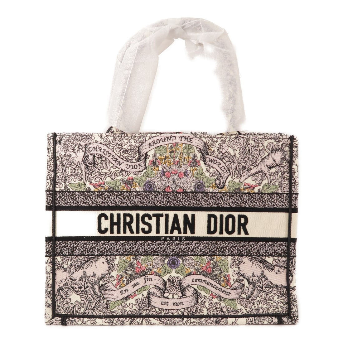 Dior CD Book Tote Medium Canvas Handbag White: Dior CD Book Tote Medium Canvas Handbag White A Christian Dior CD Book Tote medium tote bag in white canvas. It features a spacious structured design with a handle drop of 42 cm. The item is in pristi