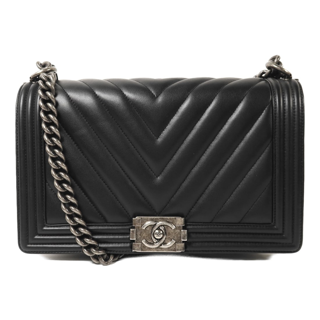 Chanel Boy 28 A92193 Black Calfskin Chain Shoulder Bag: Chanel Boy 28 A92193 Black Calfskin Chain Shoulder Bag CHANEL Boy 28 chain shoulder bag in black calfskin leather with silver-tone hardware. It features a flap closure, one open inside pocket, and one