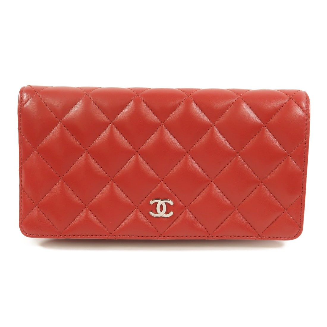 CHANEL CC Bifold Long Wallet Red Lambskin Leather SHW: CHANEL CC Bifold Long Wallet Red Lambskin Leather SHW A CHANEL long bifold wallet in red lambskin leather with silver-tone CC hardware. It features a flap pocket layout with four open sections, eight 