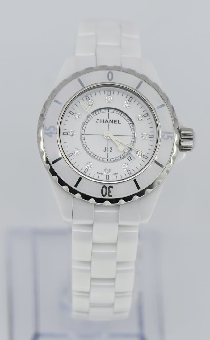 Chanel J12 H1628 Diamond Bezel White Ceramic Watch: Chanel J12 H1628 Diamond Bezel White Ceramic Watch This stunning Chanel J12 Diamond White Ceramic Watch (Model H1628) is a luxurious timepiece that combines elegance with functionality. Featuring a sl