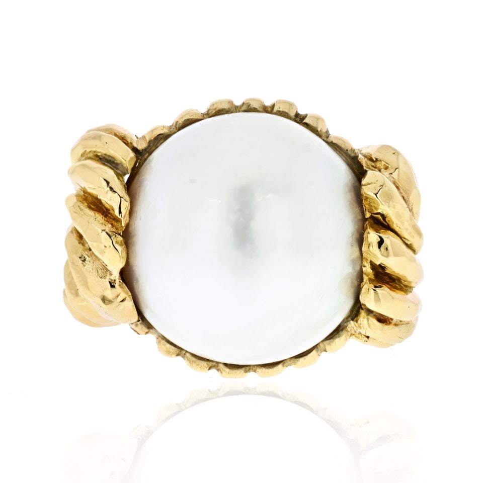 David Webb 18K Yellow Gold Cultured Mabe Pearl Ring: David Webb 18K Yellow Gold Cultured Mabe Pearl Ring This exquisite estate ring by David Webb is crafted from luxurious 18K yellow gold and features a stunning cultured mabe pearl that measures approxi