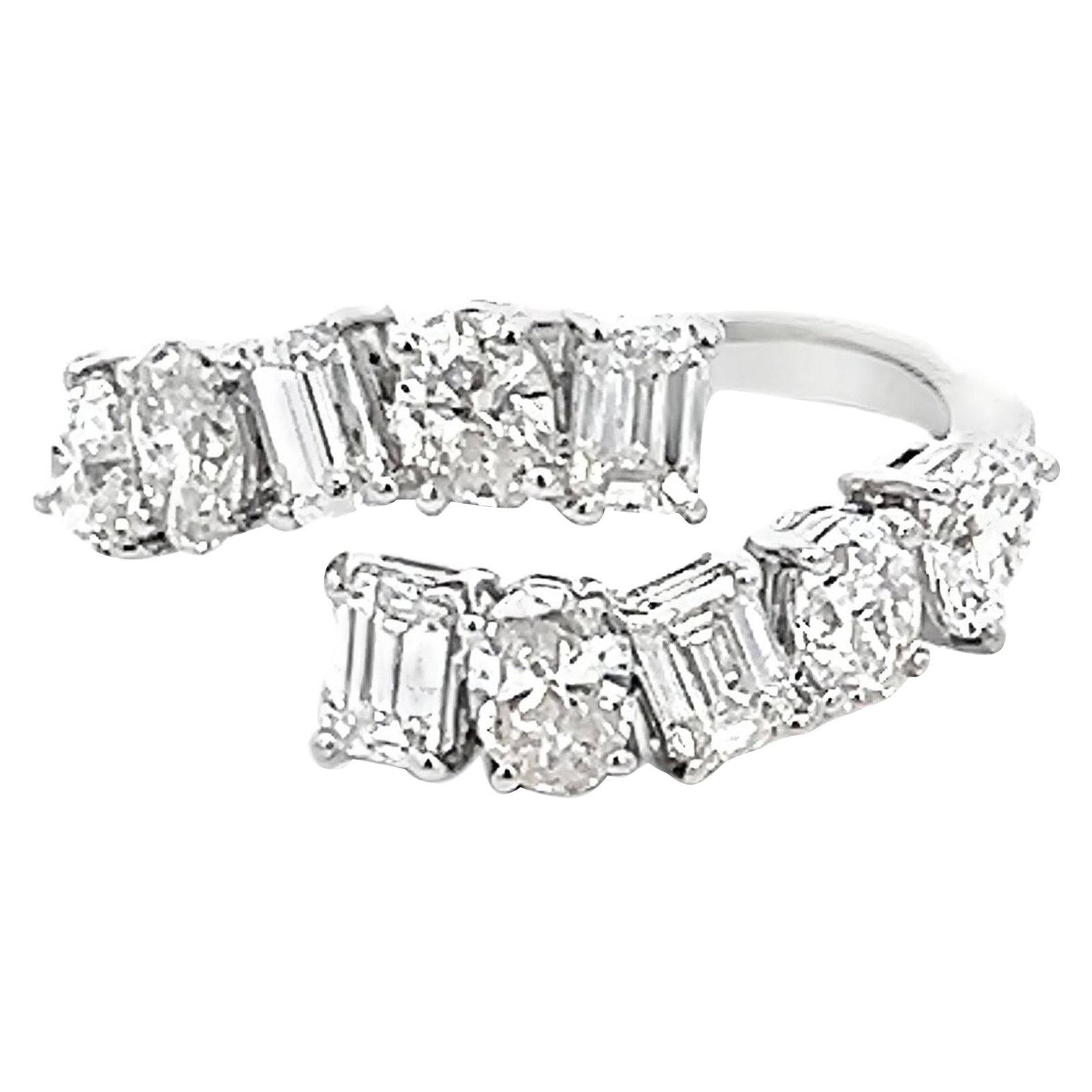 1.99ct Multi Diamond Bypass Ring 18k White Gold Resizable: 1.99ct Multi Diamond Bypass Ring 18k White Gold Resizable Elevate your style with this stunning 1.99ct Multi Diamond Bypass Ring crafted in 18k White Gold. This modern ring features a total of 1.99 ca