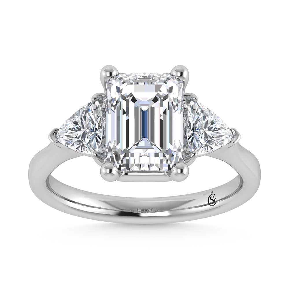 14K White Gold Lab Grown Diamond 5 1/10 Ct.Tw. Emerald Shape Three Stone Engagement Ring: 14K White Gold Lab Grown Diamond 5 1/10 Ct.Tw. Emerald Shape Three Stone Engagement Ring This stunning three-stone ring features a sparkling 4 CT Emerald Center diamond with two shimmering side diamon