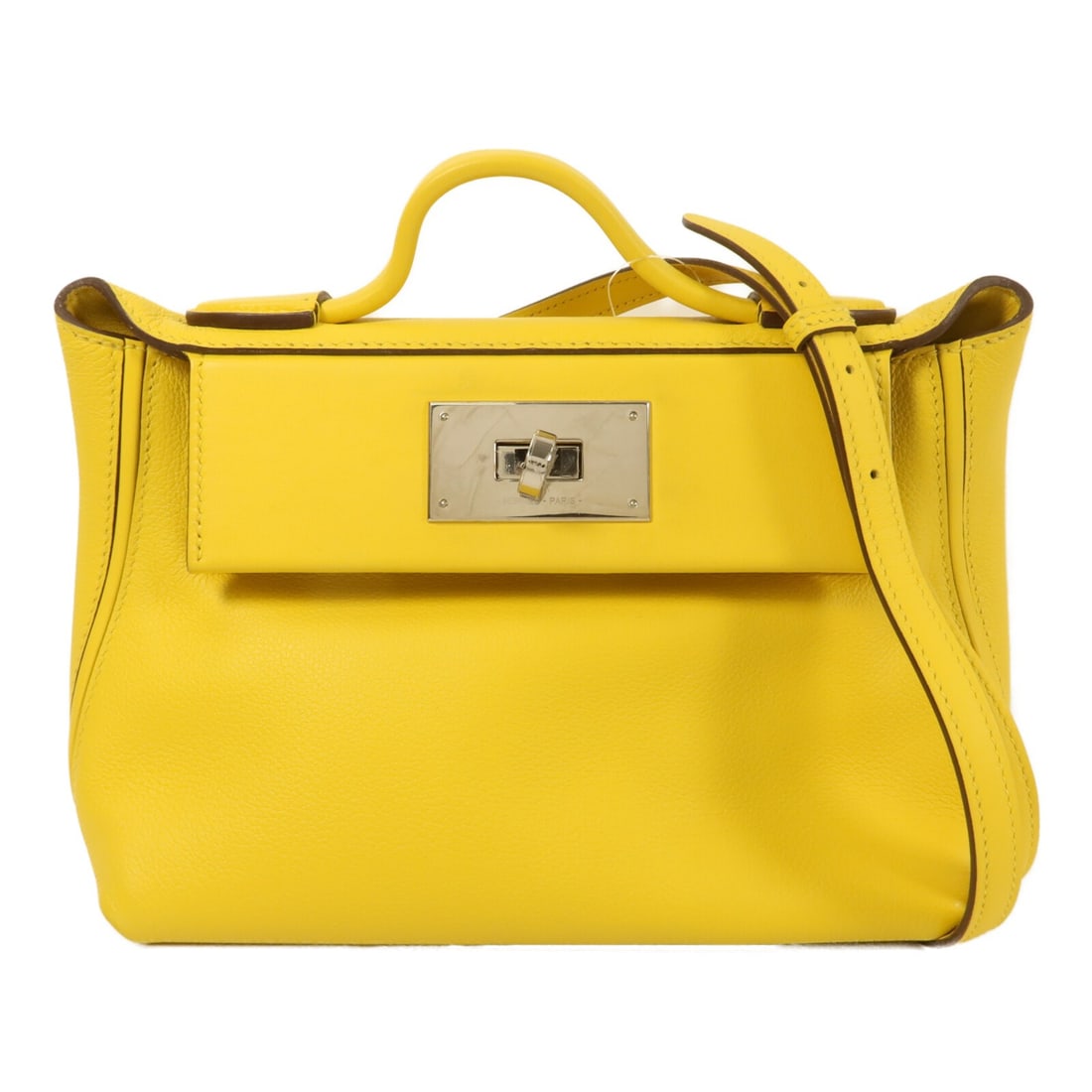 Hermes 24 24 Mini Evercolor Calfskin 2 Way Shoulder Bag Jaune Citron: Hermes 24 24 Mini Evercolor Calfskin 2 Way Shoulder Bag Jaune Citron This Hermes 24/24 Mini 2-way shoulder bag is crafted from Evercolor calfskin leather in Jaune Citron, a vibrant yellow hue. Designe