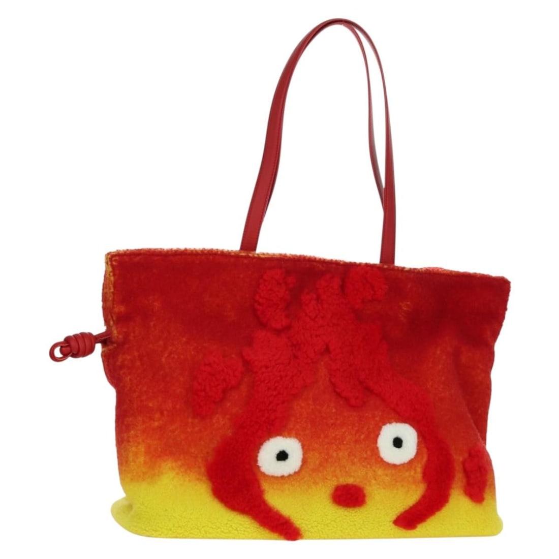 LOEWE Calcifer Flamenco Tote Bag Red Leather Howl's Moving Castle: LOEWE Calcifer Flamenco Tote Bag Red Leather Howl's Moving Castle A LOEWE x Ghibli Calcifer Flamenco Howl's Moving Castle tote bag in red leather, made in Spain. It comes with two dust bags and is pre