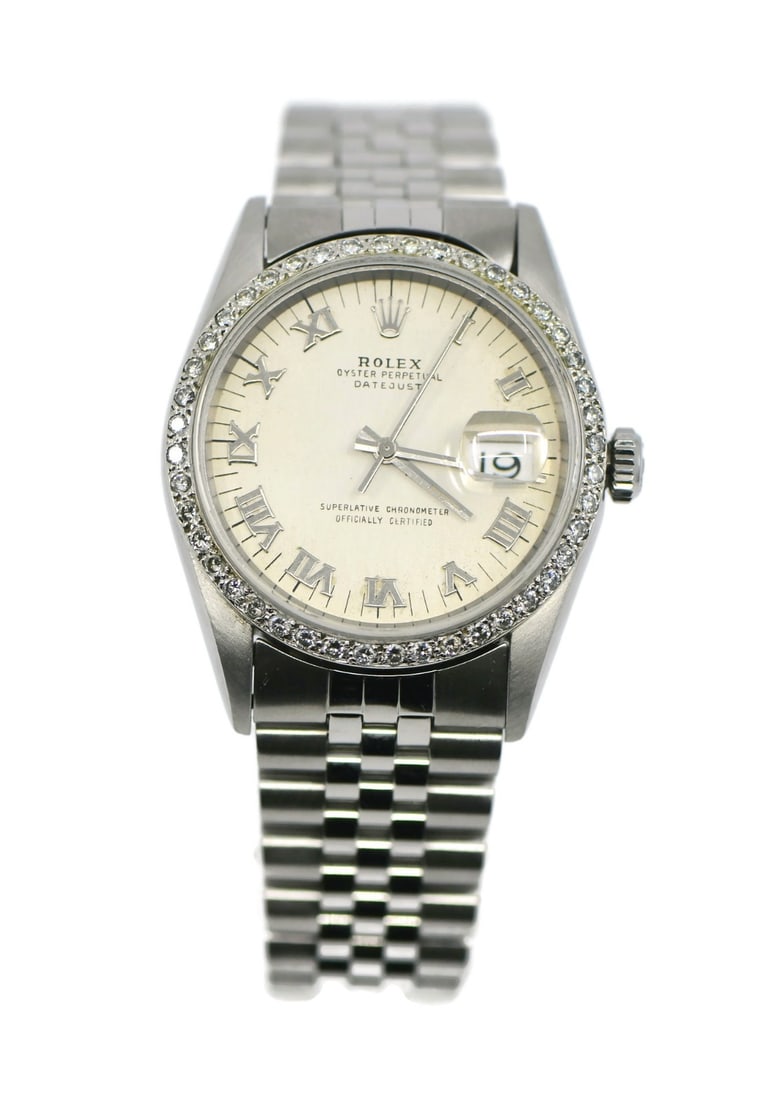Rolex 16234 Datejust wristwatch in stainless steel with diamond bezel: Rolex 16234 Datejust wristwatch in stainless steel with diamond bezel Pre-owned Rolex Datejust wristwatch in stainless steel with a polished silver-tone case and silver bezel. It features a diamond be