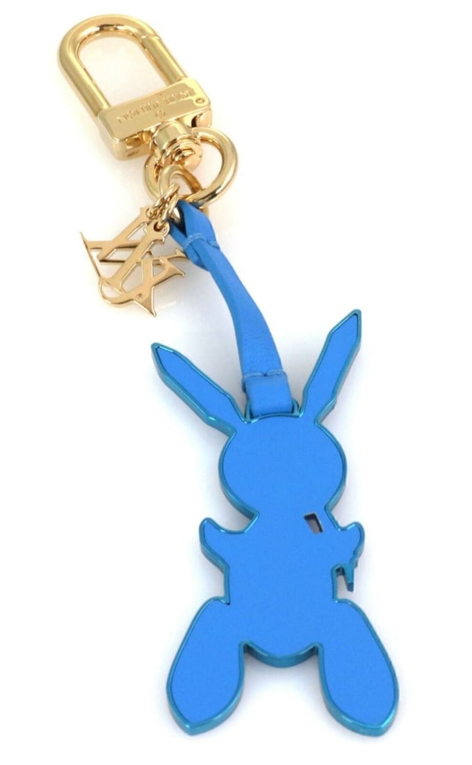 Louis Vuitton Jeff Koons Rabbit Bag Charm Key Holder Blue Leather: Louis Vuitton Jeff Koons Rabbit Bag Charm Key Holder Blue Leather Louis Vuitton Jeff Koons Rabbit bag charm key holder in yellow and blue plated metal with blue leather. It measures approximately 7.5 