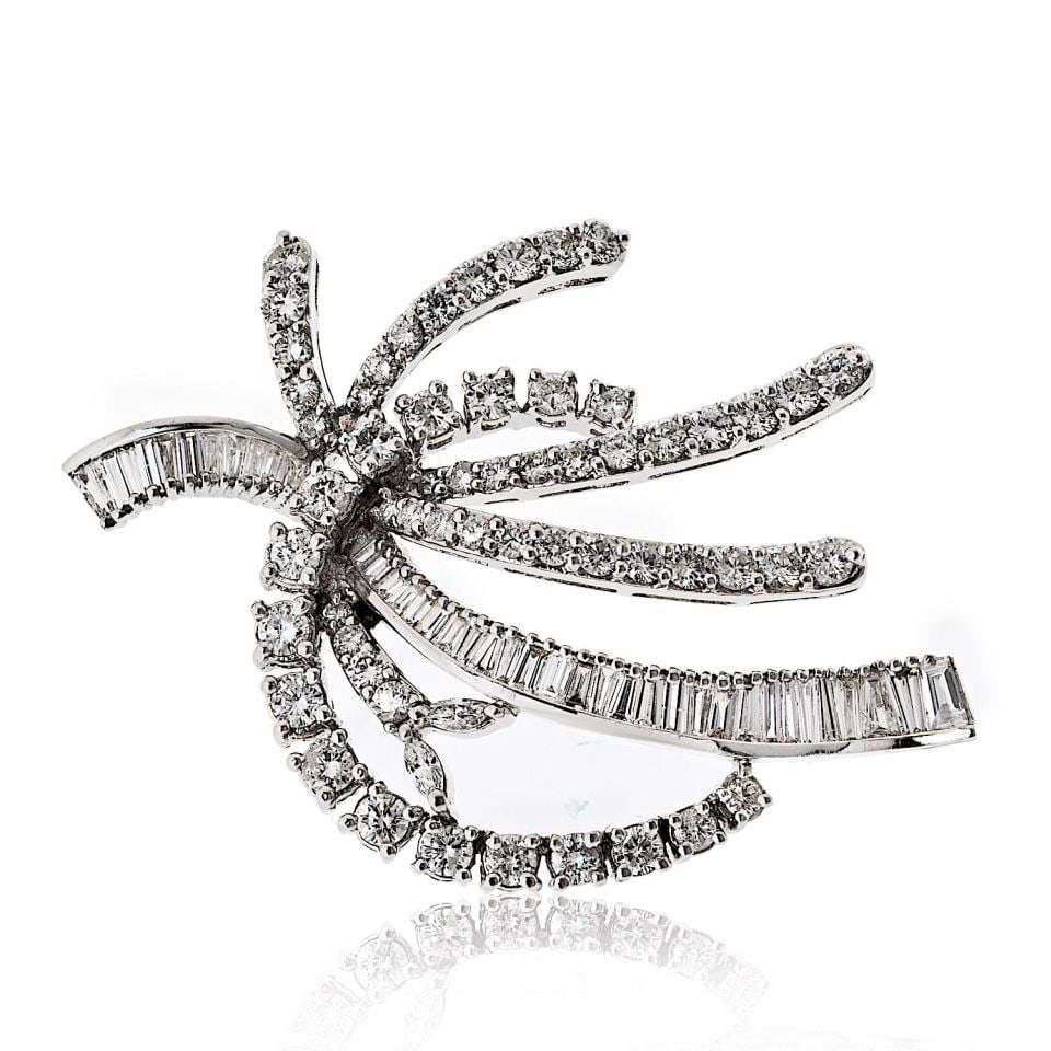 14K White Gold Diamond Brooch 5.5 Carats Round Baguette: 14K White Gold Diamond Brooch 5.5 Carats Round Baguette This exquisite brooch features a stunning combination of round and baguette diamonds set in luxurious 14K white gold. With an approximate total 