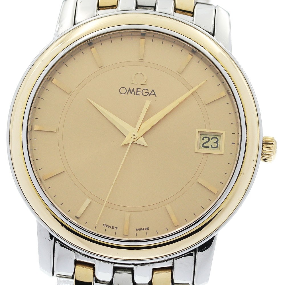 OMEGA De Ville Prestige 4310.10 mens quartz watch date YG bezel: OMEGA De Ville Prestige 4310.10 mens quartz watch date YG bezel Omega De Ville Prestige men's wristwatch, reference 4310.10, with a gold dial, date function, and quartz movement. It is a pre-owned wat