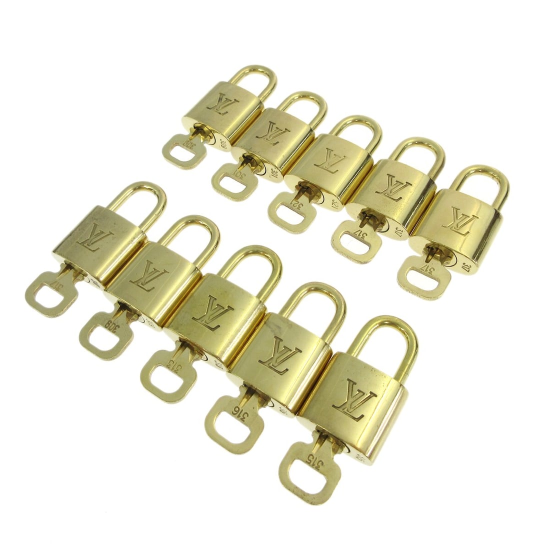 10 Louis Vuitton gold tone padlocks with keys bag charms: 10 Louis Vuitton gold tone padlocks with keys bag charms A Louis Vuitton padlock and key bag accessory charm set in gold-tone metal, made in France. The set is described as a 10 piece set and shows si