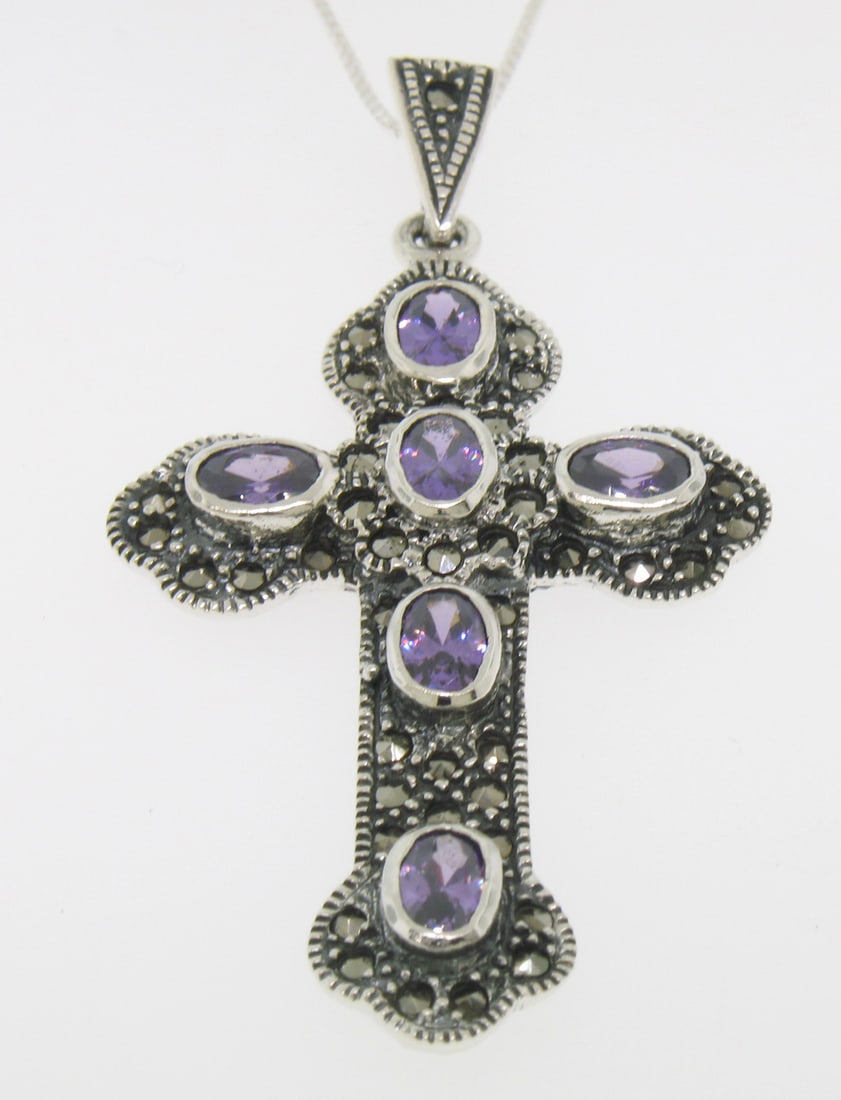 Marcasite Sterling Silver Large Amethyst Cross Necklace 2.40 Inches: Marcasite Sterling Silver Large Amethyst Cross Necklace 2.40 Inches This exquisite large cross pendant is crafted from .925 sterling silver, showcasing a stunning design that is both elegant and meani