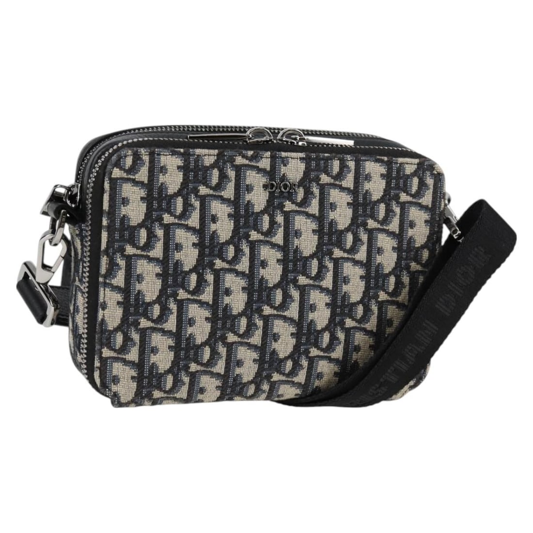 Christian Dior Trotter Shoulder Bag in Navy Silver Canvas: Christian Dior Trotter Shoulder Bag in Navy Silver Canvas Christian Dior shoulder bag in navy and silver Trotter canvas. This women's bag is made in Italy and includes a dust bag and item box. Conditi