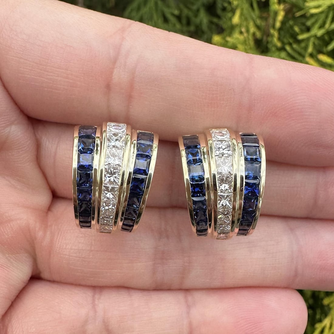 14k Yellow Gold Sapphire Diamond Cuff Earrings Channel Set Latch Back: 14k Yellow Gold Sapphire Diamond Cuff Earrings Channel Set Latch Back These elegant cuff earrings are crafted from solid 14k yellow gold and feature a sophisticated flared design. Each earring is chan