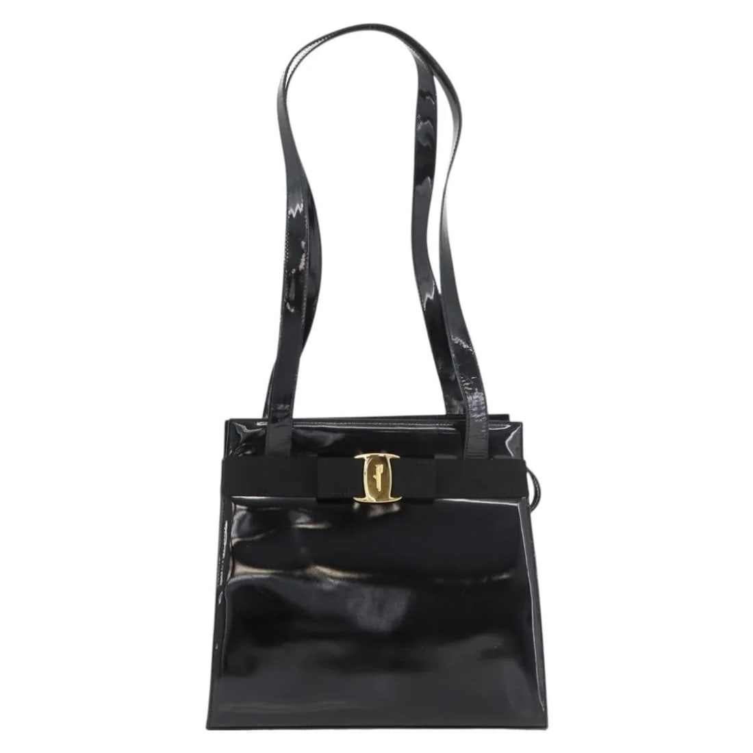Black patent leather handbag Salvatore Ferragamo Vala: Black patent leather handbag Salvatore Ferragamo Vala Salvatore Ferragamo Vala handbag in black patent leather. This vintage piece shows honest wear consistent with fair condition, including light rub
