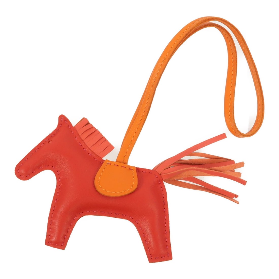 Hermes Rodeo PM Leather Bag Charm Rouge Casaque Orange: Hermes Rodeo PM Leather Bag Charm Rouge Casaque Orange HERMES Rodeo PM Charm in Agneau Milo/Veau Swift leather, presented in Rouge Casaque Orange. The item is identified as model Q5/8V/93 and is descr