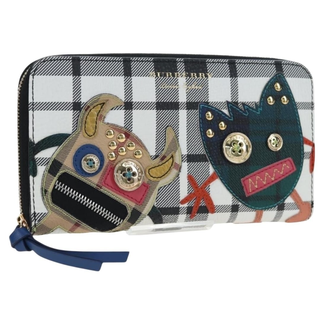 Burberry Christine leather long wallet multicolor gold tone Italy: Burberry Christine leather long wallet multicolor gold tone Italy Burberry Christine Applique round long wallet in multicolor and gold leather, made in Italy. It measures approximately W19 cm x H11 cm