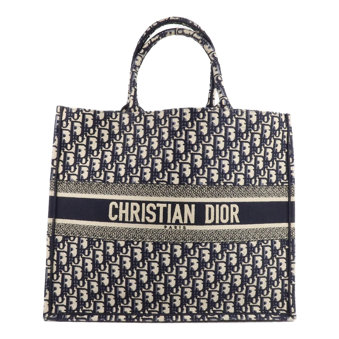 Dior M1286 Large CD Book Tote Blue Canvas Bag: Dior M1286 Large CD Book Tote Blue Canvas Bag Christian Dior CD Book Tote Large M1286 is a blue canvas tote bag in very good AB condition. It features the listed model number M1286 and comes with the 