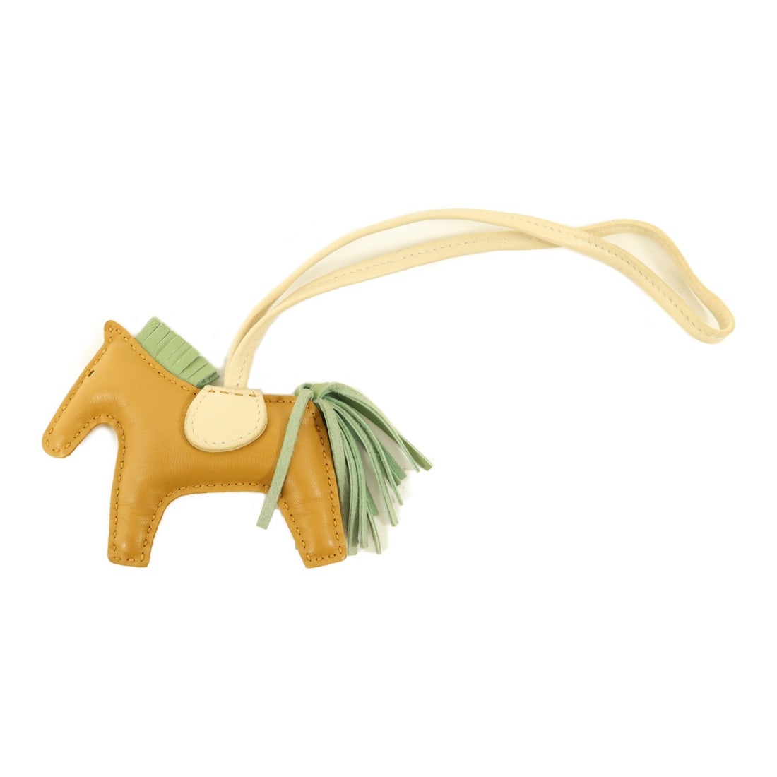 HERMES Rodeo PM Milo Lambskin Charm Sesame Vert Criquet: HERMES Rodeo PM Milo Lambskin Charm Sesame Vert Criquet Hermes Rodeo PM charm in Milo leather, presented in Sesame and Vert Criquet colors. This women's charm is made in France and comes in a regular 