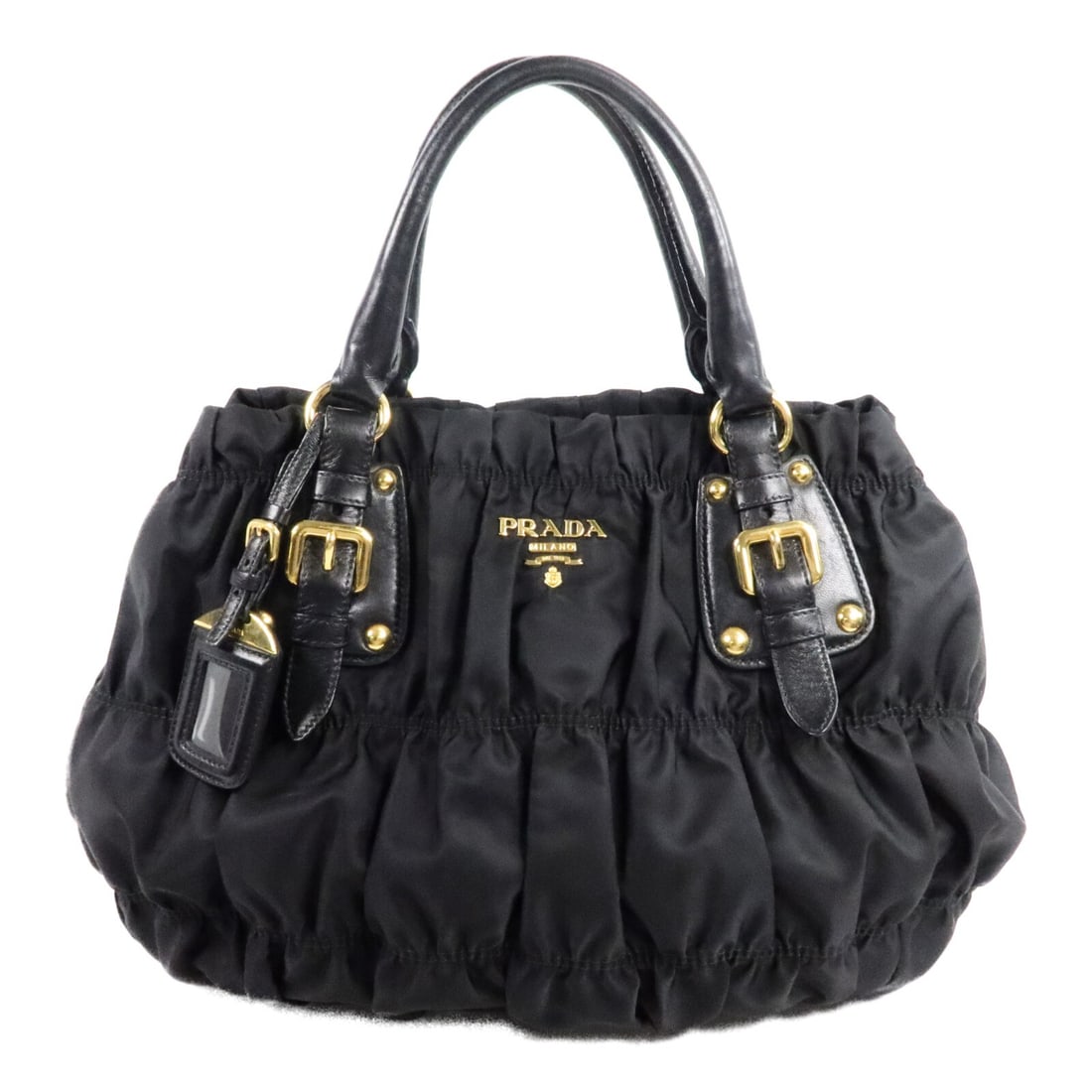 Prada Tessuto Gaufre Nylon Handbag Black with Name Tag: Prada Tessuto Gaufre Nylon Handbag Black with Name Tag PRADA GHW Tessuto Gaufre Bag Hand Bag in black nylon. It features a magnetic pocket, two open interior pockets, one interior zip pocket, and come