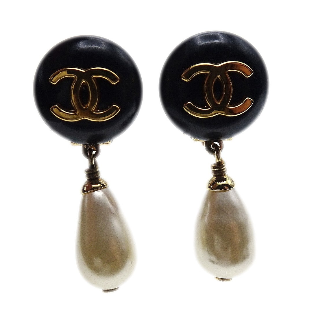 Chanel 96A Clip On Dangle Earrings Artificial Pearl Black Gold: Chanel 96A Clip On Dangle Earrings Artificial Pearl Black Gold Pair of Chanel clip-on dangle earrings featuring black and gold accents with artificial pearl drops. Made in France, these earrings have 