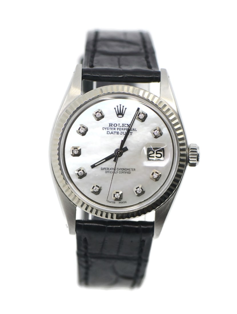 Rolex Datejust 1601 36 mm wristwatch with box aftermarket strap: Rolex Datejust 1601 36 mm wristwatch with box aftermarket strap Rolex Datejust wristwatch reference 1601 with a 36 mm stainless steel case, silver dial, and analog display. It features a mechanical au