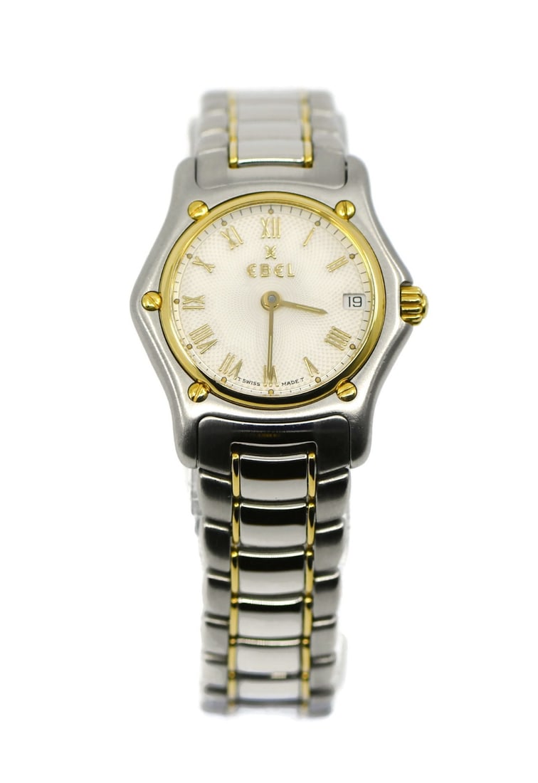 EBEL 1911 Two Tone Stainless Steel Quartz Watch 188901 with Box and Papers: EBEL 1911 Two Tone Stainless Steel Quartz Watch 188901 with Box and Papers This Ebel 1911 Two Tone Stainless Steel Watch is a sophisticated timepiece designed for elegance and functionality. Featuring