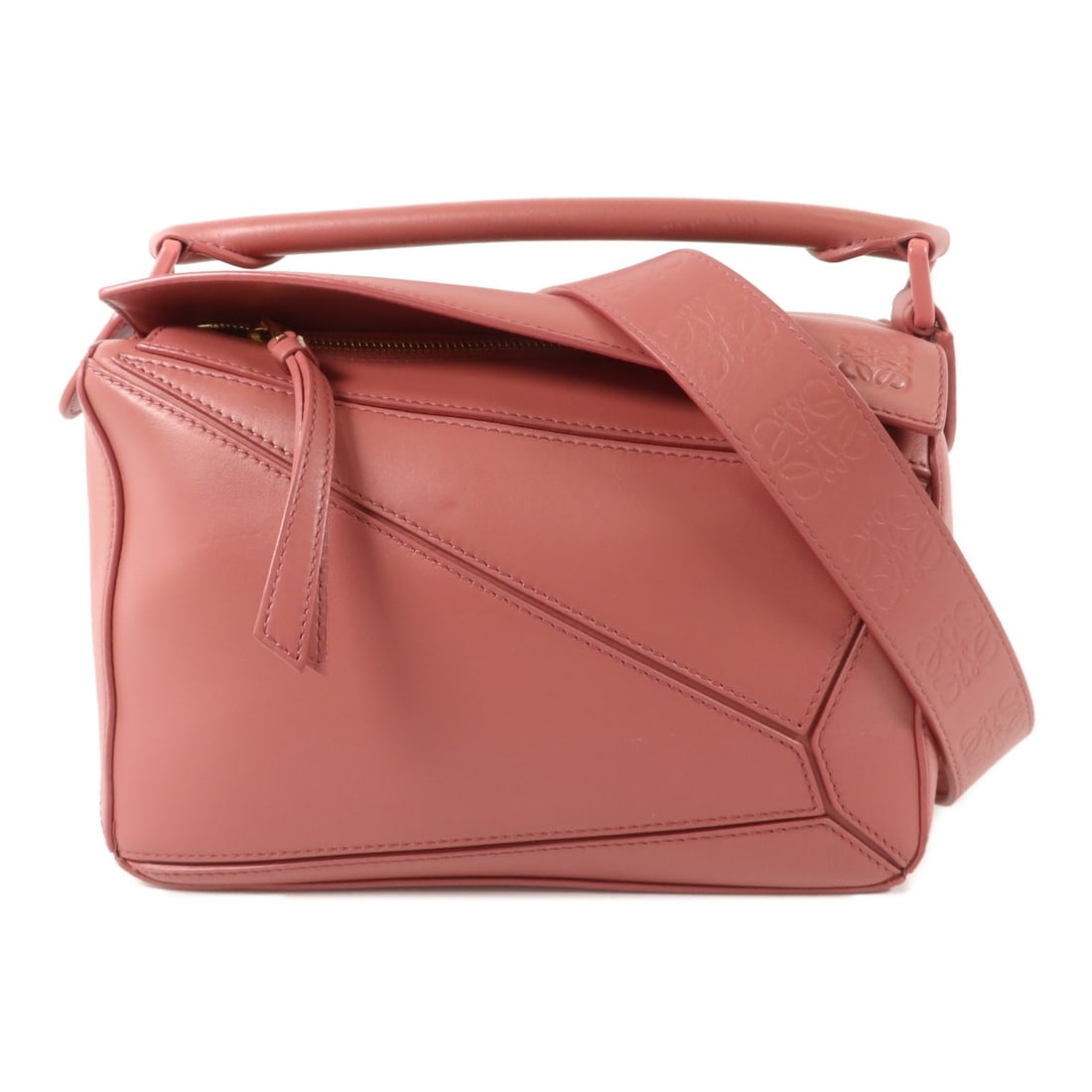LOEWE Puzzle A510S22 2 Way Shoulder Bag Red Calfskin: LOEWE Puzzle A510S22 2 Way Shoulder Bag Red Calfskin LOEWE Puzzle 2 Way Shoulder Bag in calfskin leather with a raspberry red/red colorway. This women's regular-size bag features a 2-way shoulder bag 