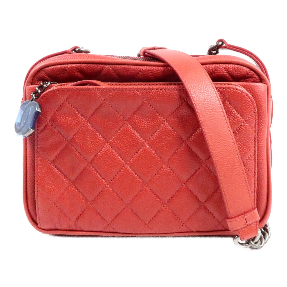 CHANEL CC Red Calfskin Chain Shoulder Bag: CHANEL CC Red Calfskin Chain Shoulder Bag A CHANEL CC Chain Shoulder Bag in red calfskin leather with a chain shoulder strap. The bag features a fastener closure and multiple pockets, including exteri