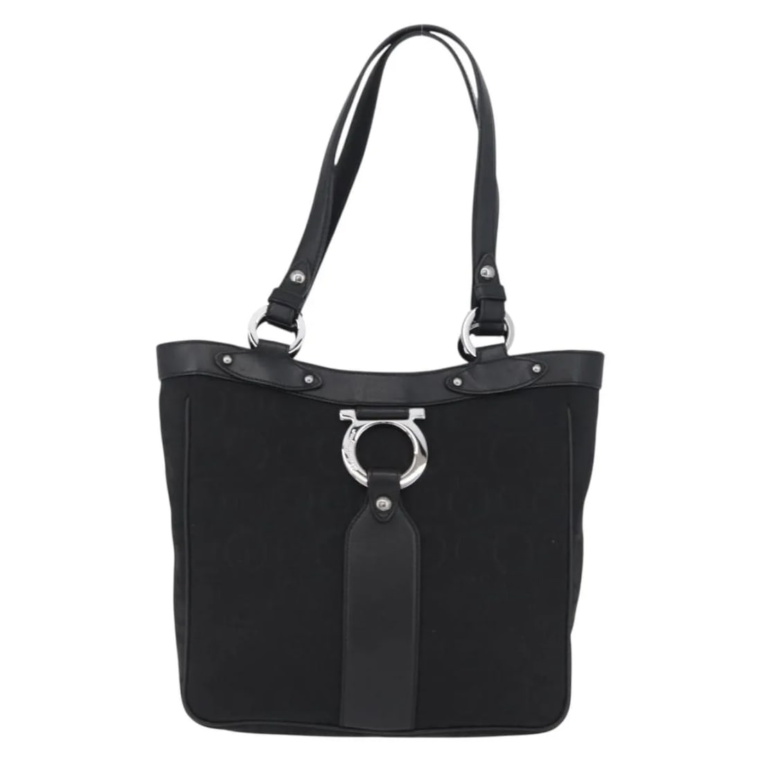 Black Canvas Tote Bag Salvatore Ferragamo Vintage: Black Canvas Tote Bag Salvatore Ferragamo Vintage This Salvatore Ferragamo vintage tote bag for women features black canvas material with leather accents. It presents slight rubbing on the surface, le