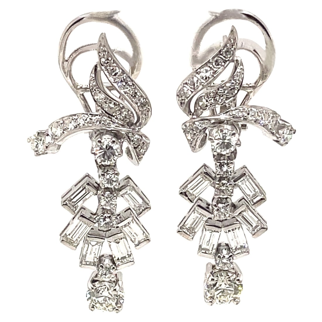 EGL Certified Edwardian 4.40ct Diamond Platinum Chandelier Earrings: EGL Certified Edwardian 4.40ct Diamond Platinum Chandelier Earrings Experience the elegance of these stunning Edwardian-style chandelier earrings, crafted in luxurious platinum. Featuring two center r