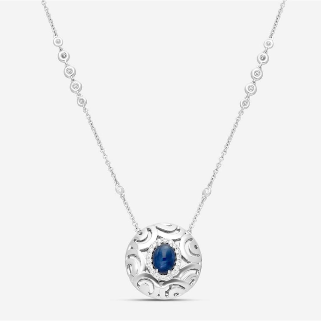 Crivelli Ricami Luci Sapphire Diamond Pendant Necklace 18k White Gold: Crivelli Ricami Luci Sapphire Diamond Pendant Necklace 18k White Gold This Crivelli Ricami Luci pendant necklace is crafted from 18k white gold and features a round pendant with an oval cabochon blue 