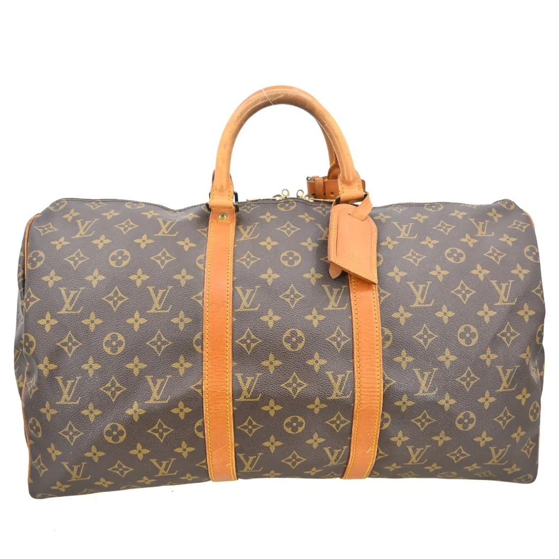 Louis Vuitton Keepall Travel Bag Monogram Canvas Brown: Louis Vuitton Keepall Travel Bag Monogram Canvas Brown Louis Vuitton Keepall in brown monogram canvas. This unisex bag is in good condition with visible wear, including scuffs, scratches, cracks, and 