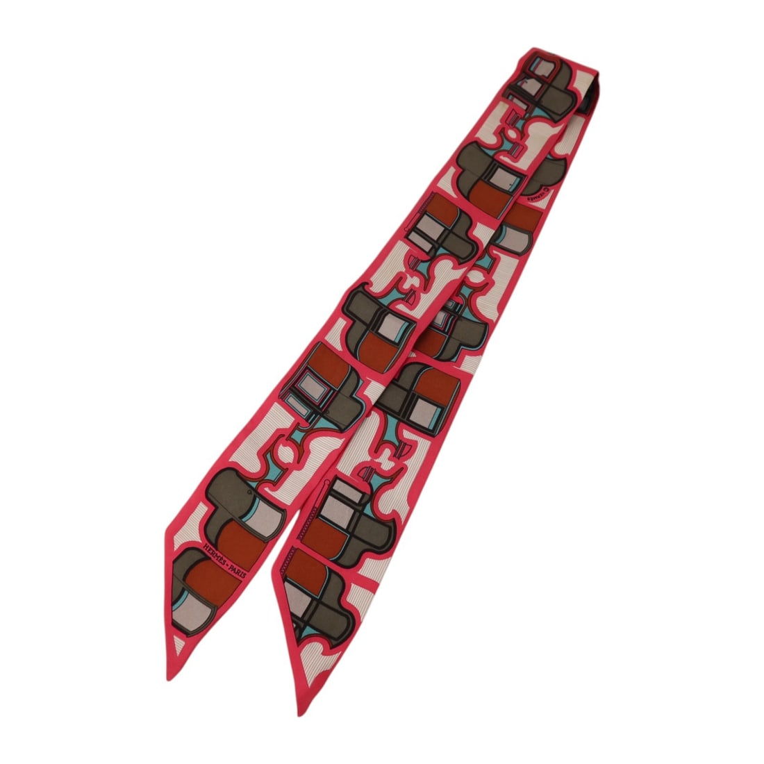 HERMES Twilly Silk Scarf Pink Khaki Red Multicolor: HERMES Twilly Silk Scarf Pink Khaki Red Multicolor A Hermes Twilly scarf in silk with a pink, khaki, red, and multicolor design. Made in France, this women's regular-size scarf measures 86 cm x 5 cm. 