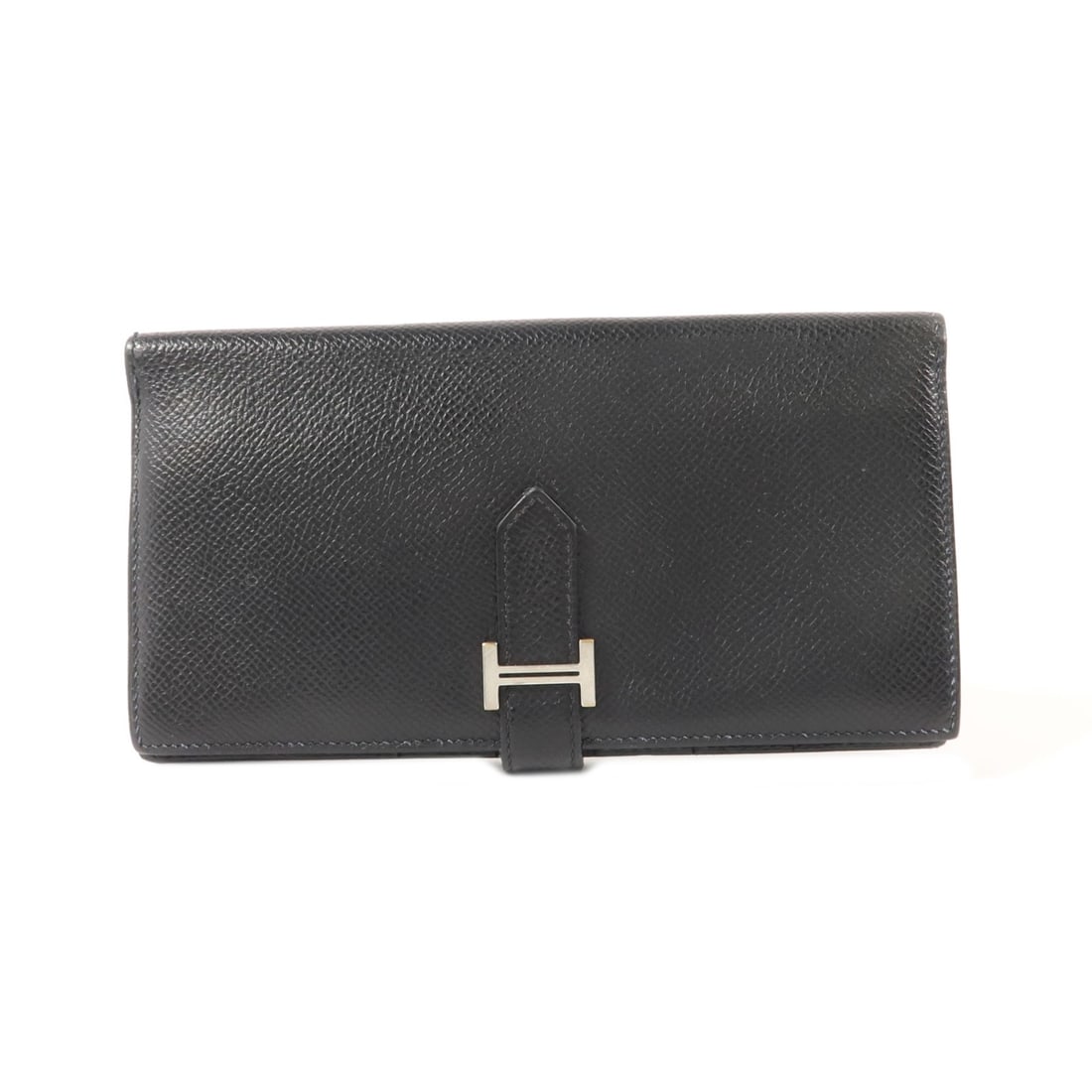 Hermes Bearn long wallet in Noir Epsom calfskin with palladium hardware: Hermes Bearn long wallet in Noir Epsom calfskin with palladium hardware Long wallet in Noir black with Epsom leather and calfskin (cowhide) construction. It features a Bearn design with PHW hardware a