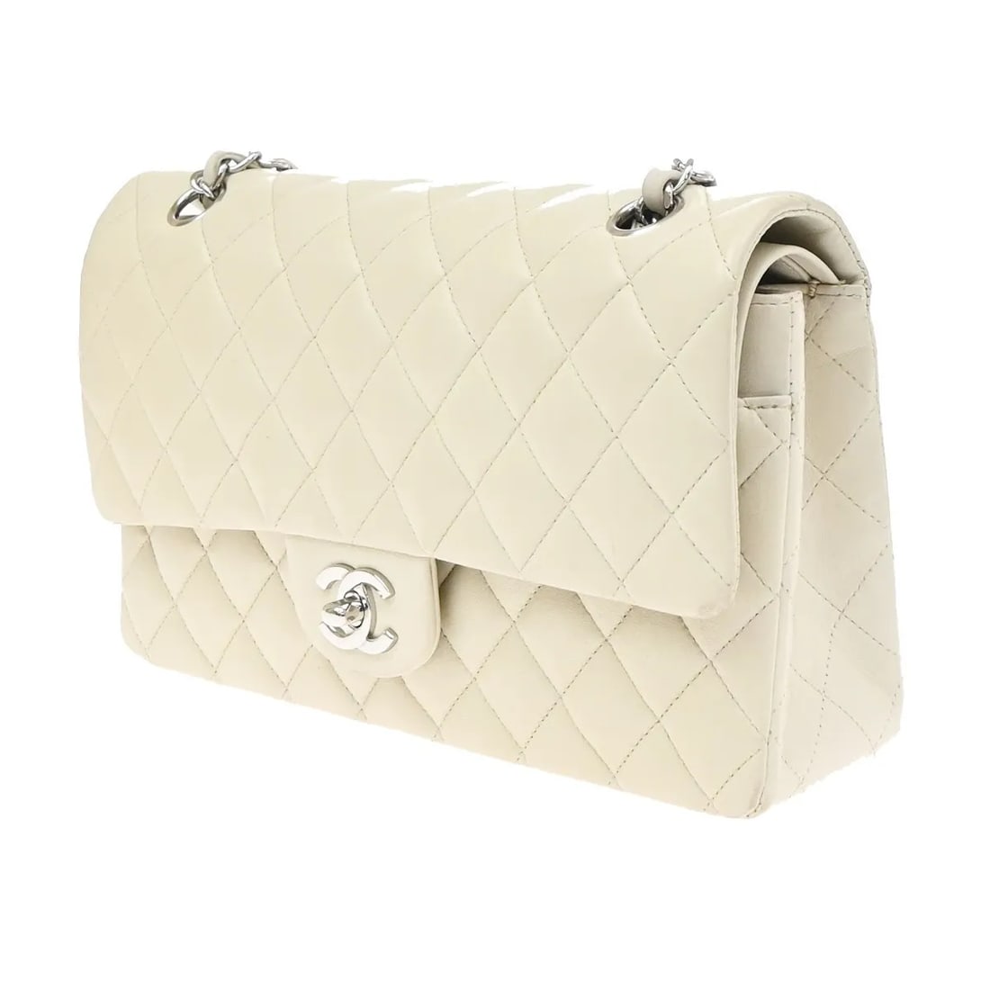 Chanel Vintage Classic Double Flap White Caviar Leather Bag: Chanel Vintage Classic Double Flap White Caviar Leather Bag Chanel Vintage Classic Double Flap bag in white leather with a quilted design. Made in France, this female-style handbag measures 25 cm x 15