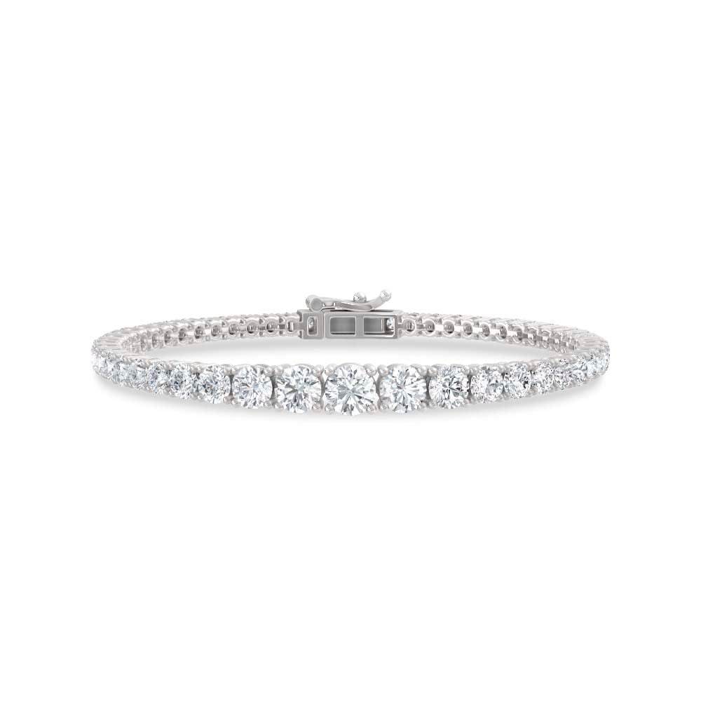 14K White Gold Lab Grown Diamond 7 Ct.Tw. Gratuating Bracelet: 14K White Gold Lab Grown Diamond 7 Ct.Tw. Gratuating Bracelet This 14K White Gold graduating bracelet showcases lab grown diamonds totaling 7 Ct.Tw., delivering refined brilliance. 14k White Gold Ston