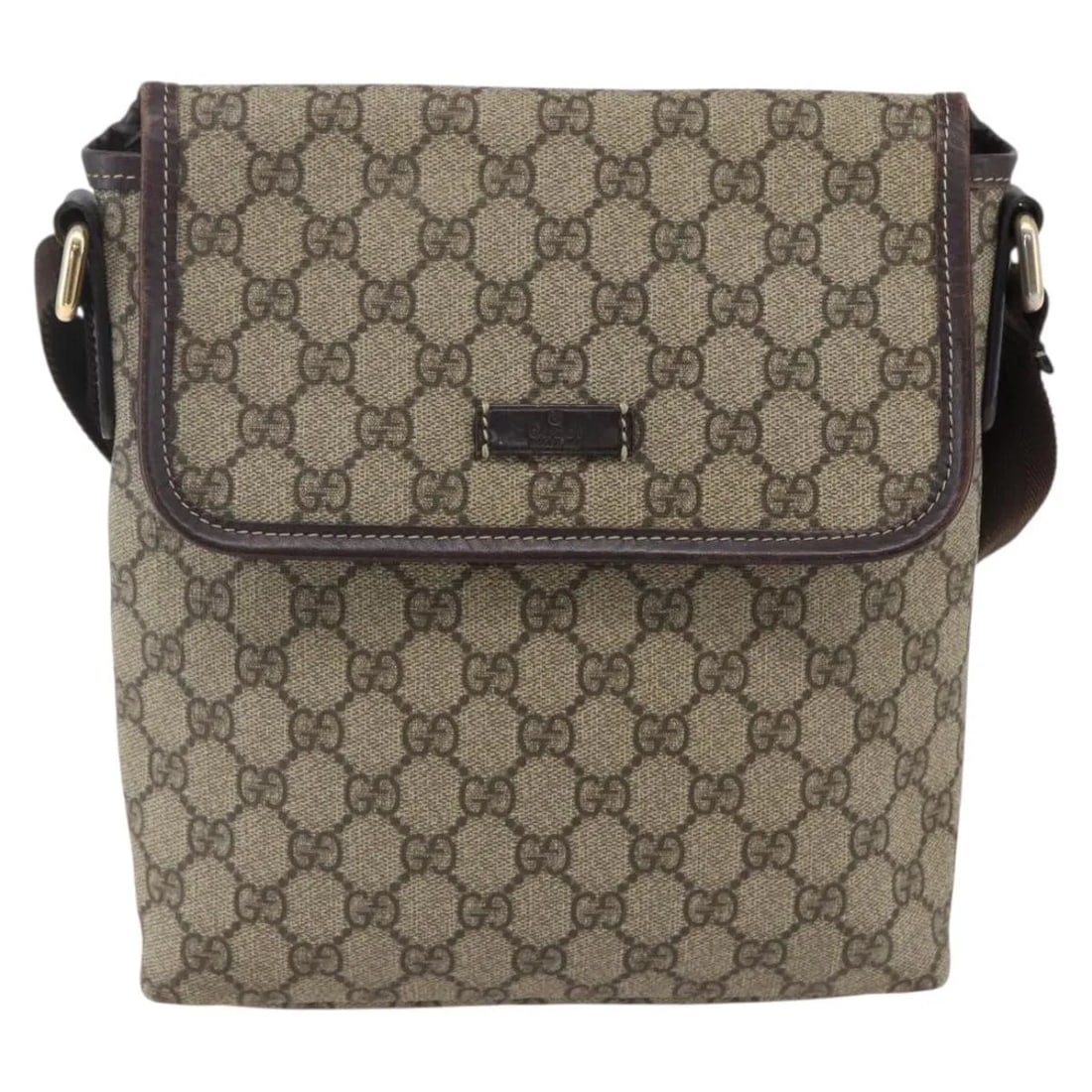 Flap Messenger Bag Beige GG Canvas by Gucci: Flap Messenger Bag Beige GG Canvas by Gucci This Gucci Flap Messenger bag features the iconic GG coated canvas in beige, designed for unisex use. It offers a practical flap closure and a comfortable s
