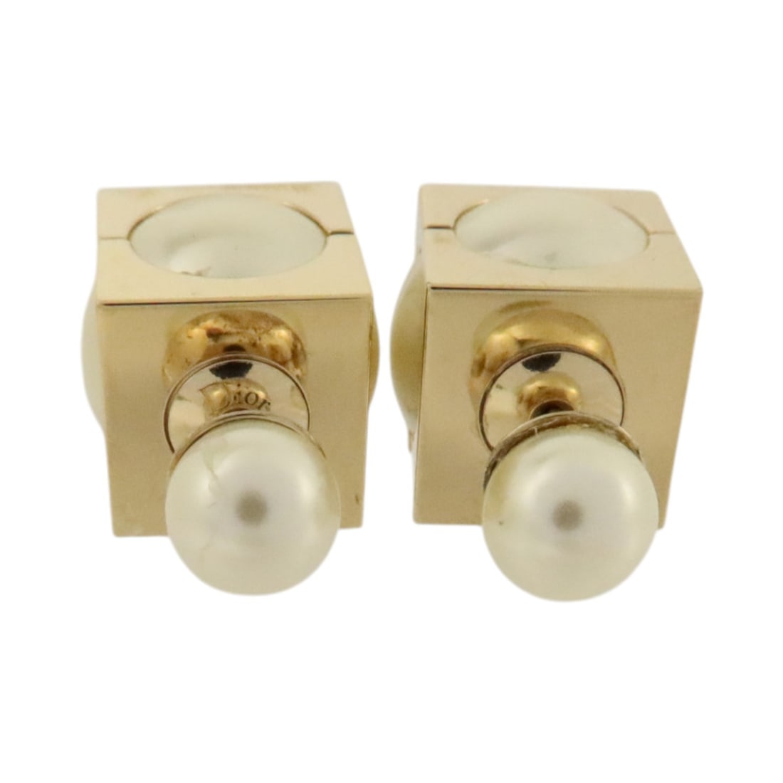Dior CD Tribal Cube PVC Metal Earrings White Gold Tone: Dior CD Tribal Cube PVC Metal Earrings White Gold Tone Christian Dior CD Tribal Cube Earrings in gold and white. Made from PVC and metal, these earrings measure 7/12 mm x 7/12 mm (2.8" x 2.8"). The it