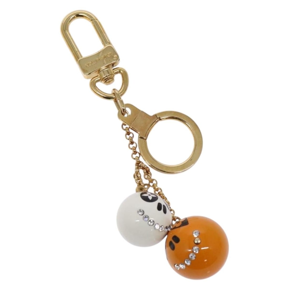 LOUIS VUITTON Gold Metal Key Holder M60076 Made in Italy: LOUIS VUITTON Gold Metal Key Holder M60076 Made in Italy This LOUIS VUITTON Porte Cles Chaine Key Holder showcases a stylish blend of functionality and luxury. Crafted from durable metal, it features 