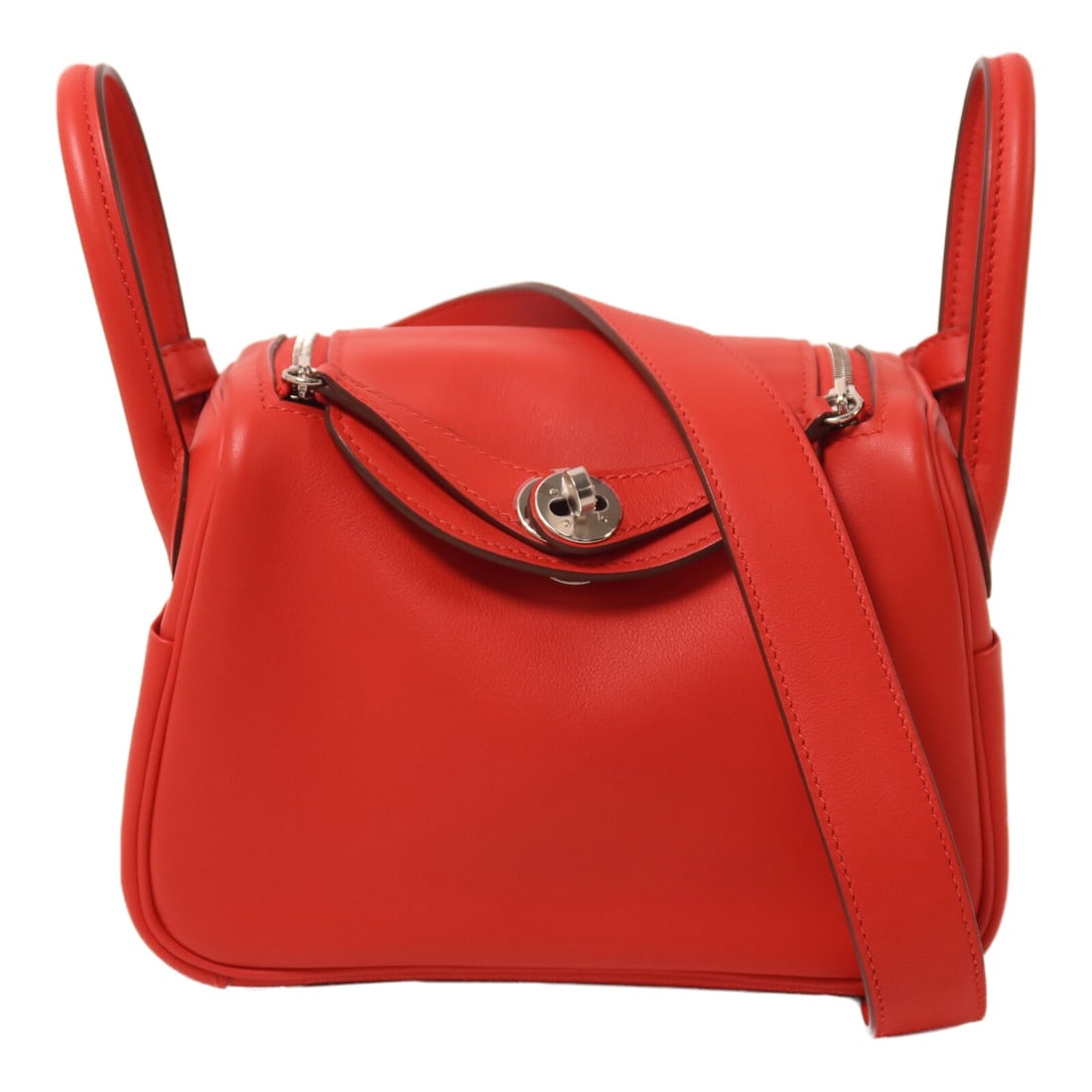 HERMES Mini Lindy 2 Way Shoulder Bag Swift Calfskin Rouge de Coeur: HERMES Mini Lindy 2 Way Shoulder Bag Swift Calfskin Rouge de Coeur HERMES PHW Mini Lindy 2 Way Shoulder Bag in Veau Swift leather and calfskin (cowhide), presented in Rouge de Coeur / red tones. This 