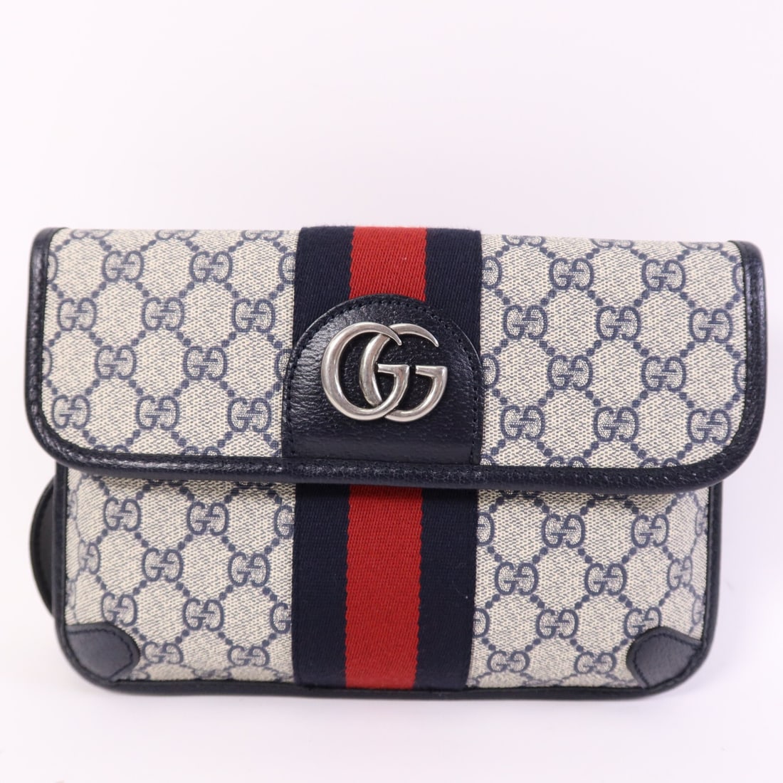 Gucci Ophidia 674081 GG Supreme Waist Bag Coated Canvas Navy Gray: Gucci Ophidia 674081 GG Supreme Waist Bag Coated Canvas Navy Gray A Gucci Ophidia GG Supreme waist bag in navy and gray with silver-tone hardware. It is made from PVC coated canvas and features a magn