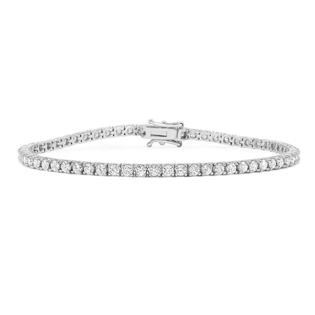 Rachel Koen 14K White Gold Tennis Bracelet 3.12CT 62 Diamonds: Rachel Koen 14K White Gold Tennis Bracelet 3.12CT 62 Diamonds This stunning Rachel Koen tennis bracelet showcases a classic design adorned with 62 round brilliant cut diamonds totaling 3.12 carats. Cr