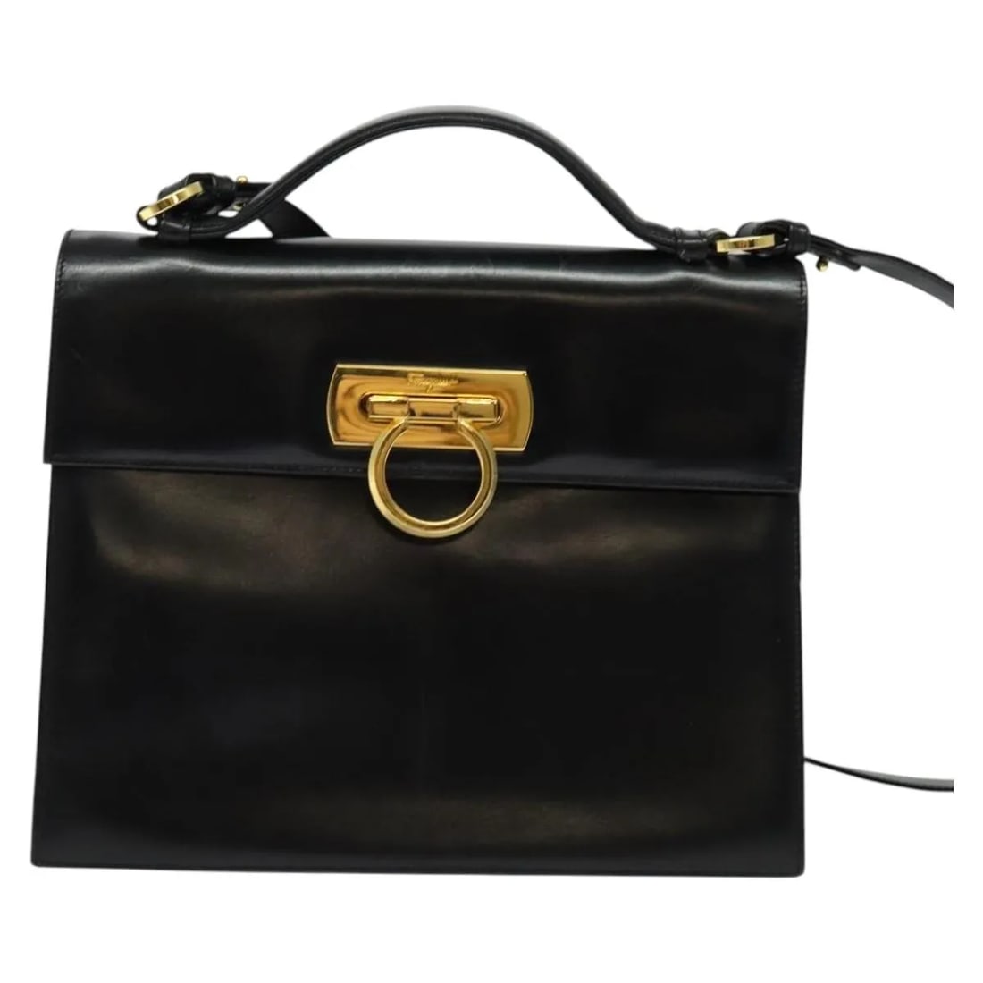 Black Leather Top Handle Bag Salvatore Ferragamo Gancini Convertible: Black Leather Top Handle Bag Salvatore Ferragamo Gancini Convertible Salvatore Ferragamo Gancini Convertible Top Handle bag in black leather, designed for women and made in Italy. It features a conver